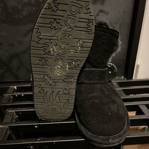 Used black and gray BearPaw boots